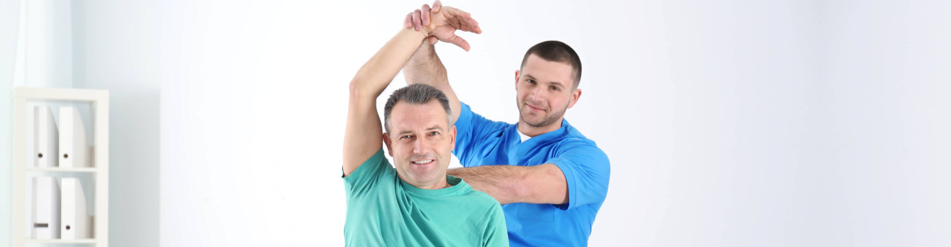 caregiver conducting physical therapy